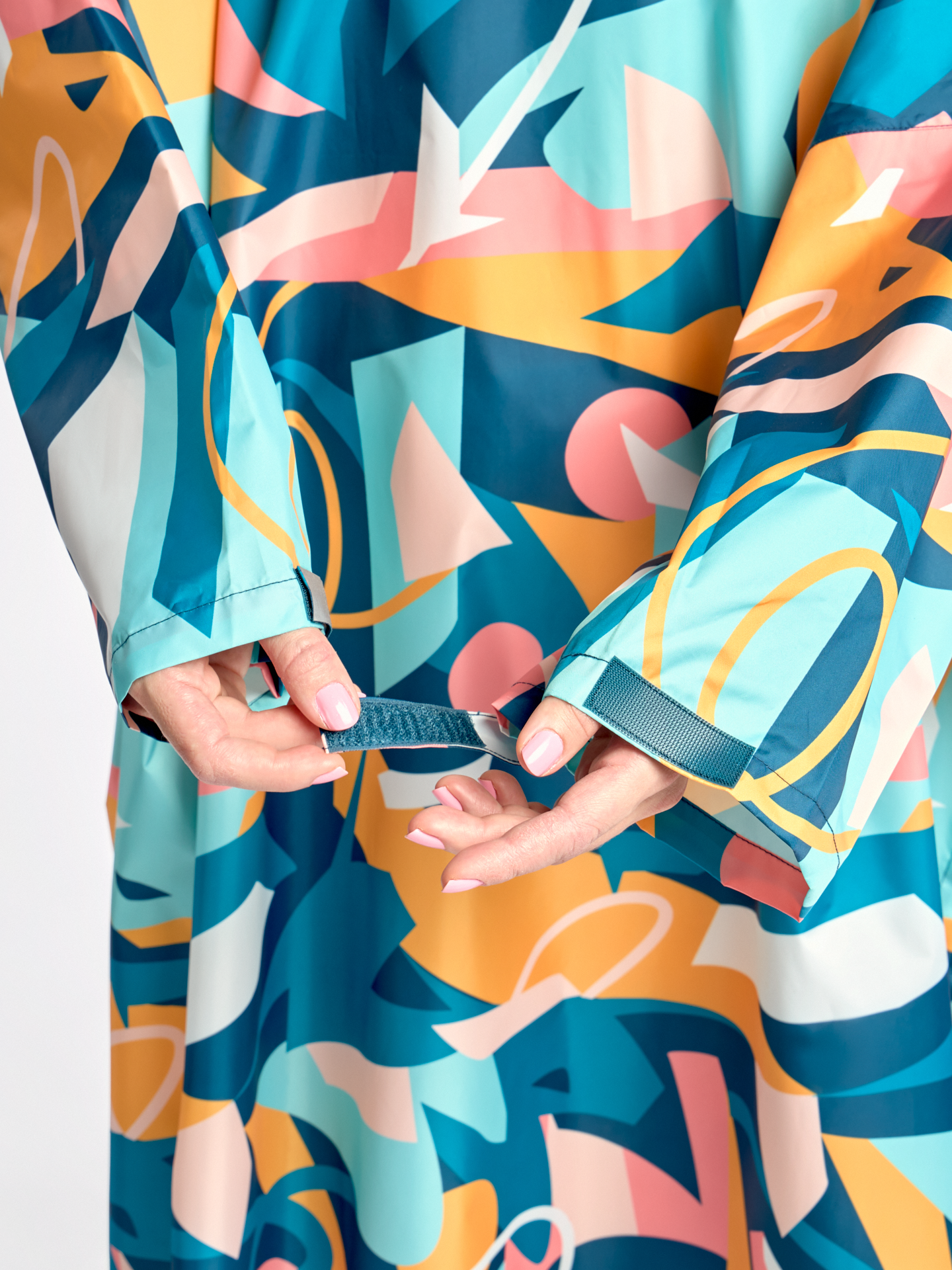 raincoat-colourful-geometry-9d/9dbc1757463bdff1c8eb8bb7fae8c3b91d7bfda9