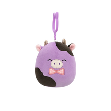 Squishmallows Clip-On Alexie la Vaca Morada y Negra con Pajarita, 9 cm